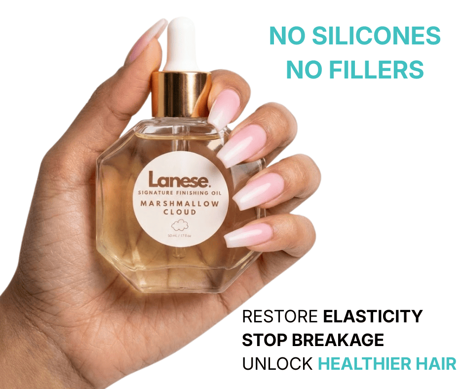 A close-up of a person’s hand with long, pink ombré nails holding a hexagonal glass bottle of Lanese Signature Finishing Oil in the scent "Marshmallow Cloud." To the right, teal text reads "NO SILICONES, NO FILLERS," and black text below reads "RESTORE ELASTICITY, STOP BREAKAGE, UNLOCK HEALTHIER HAIR."
