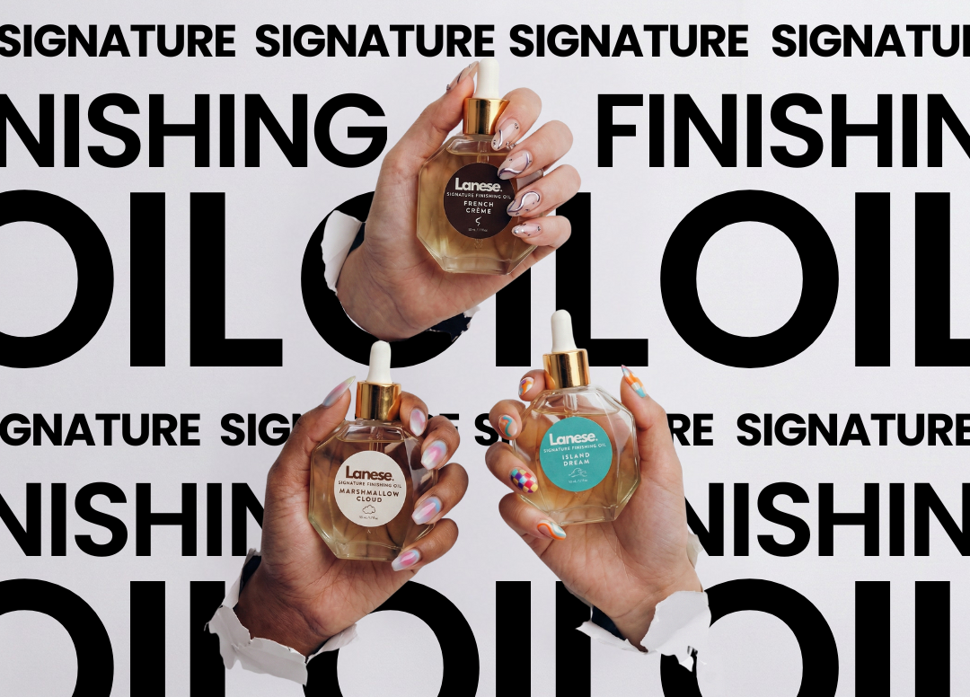 Three hands hold Lanese signature finishing hair oil bottles in different scents against a bold black-and-white background reading “Signature Finishing Oil,” highlighting the brand’s luxury packaging and textured nail art.